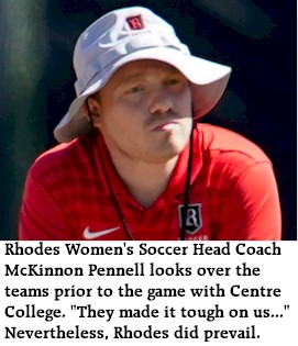 Rhodes Coach McKinnon Pennell ponders game with Centre moments before the start.